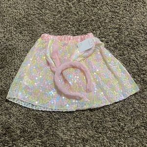 (38) Claire’s Easter Headband and skirt.